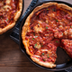 deep dish pizza in cast iron pans